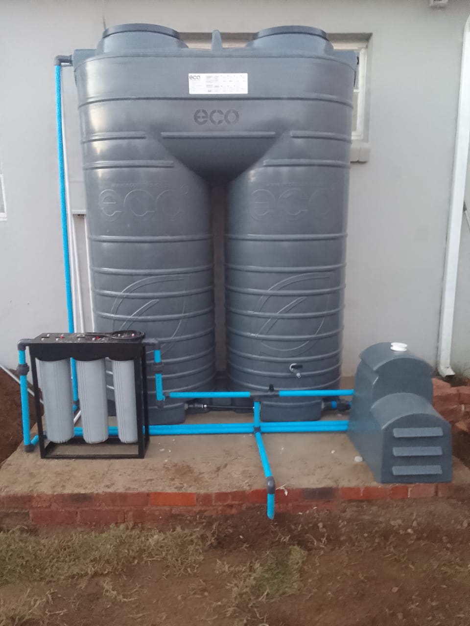 Twin grey Eco tanks with filter rack and pump cover